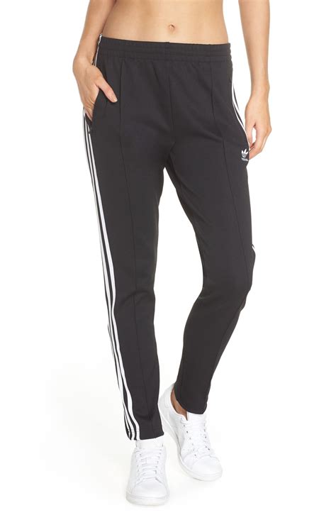 Adidas originals sst track pants + FREE SHIPPING .